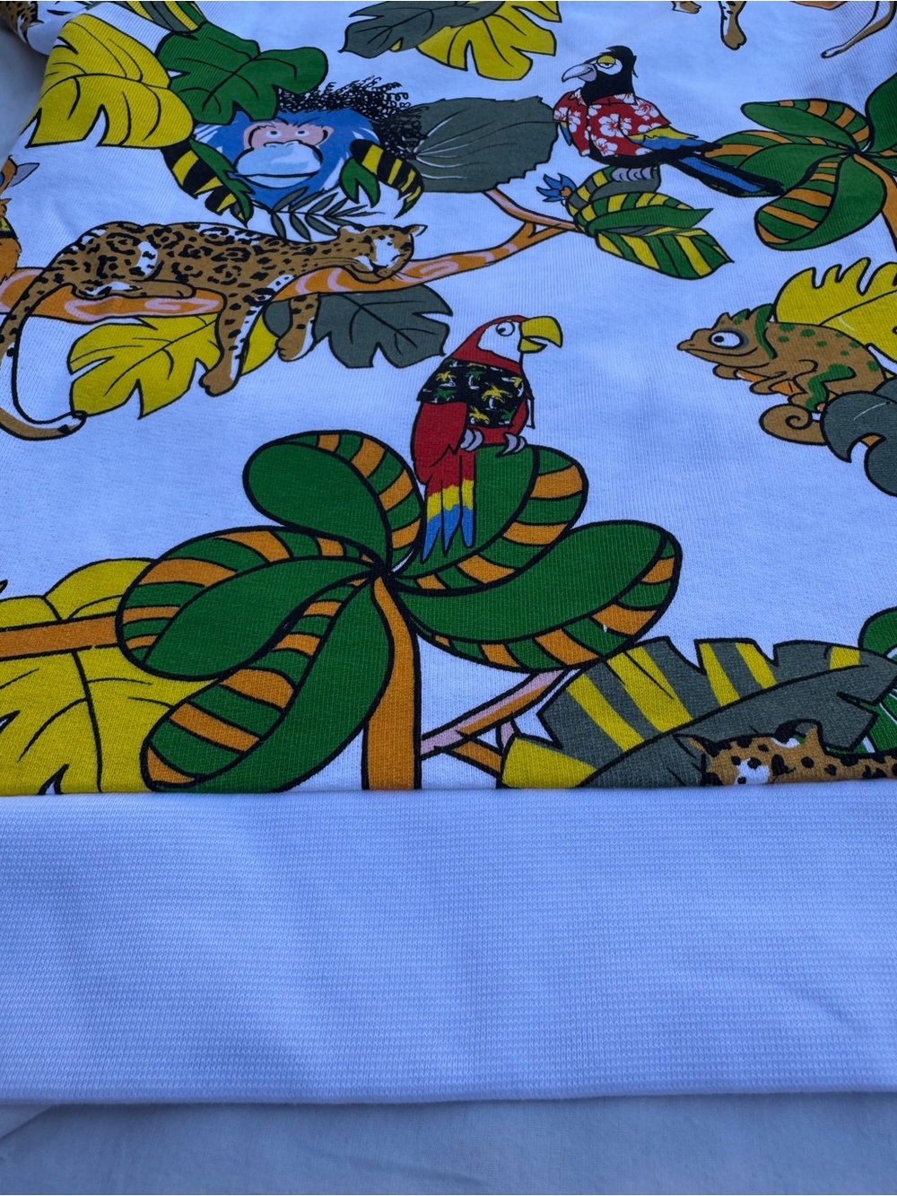 STELLA MCCARTNEY
KIDS' WHITE SWEATSHIRT WITH JUNGLE PRINT size 8 - Picture 10 of 11